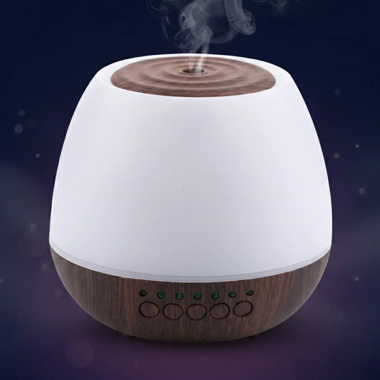 Deep Drift aroma diffuser with wood grain base releasing calming mist against a dark background for relaxation and sleep support