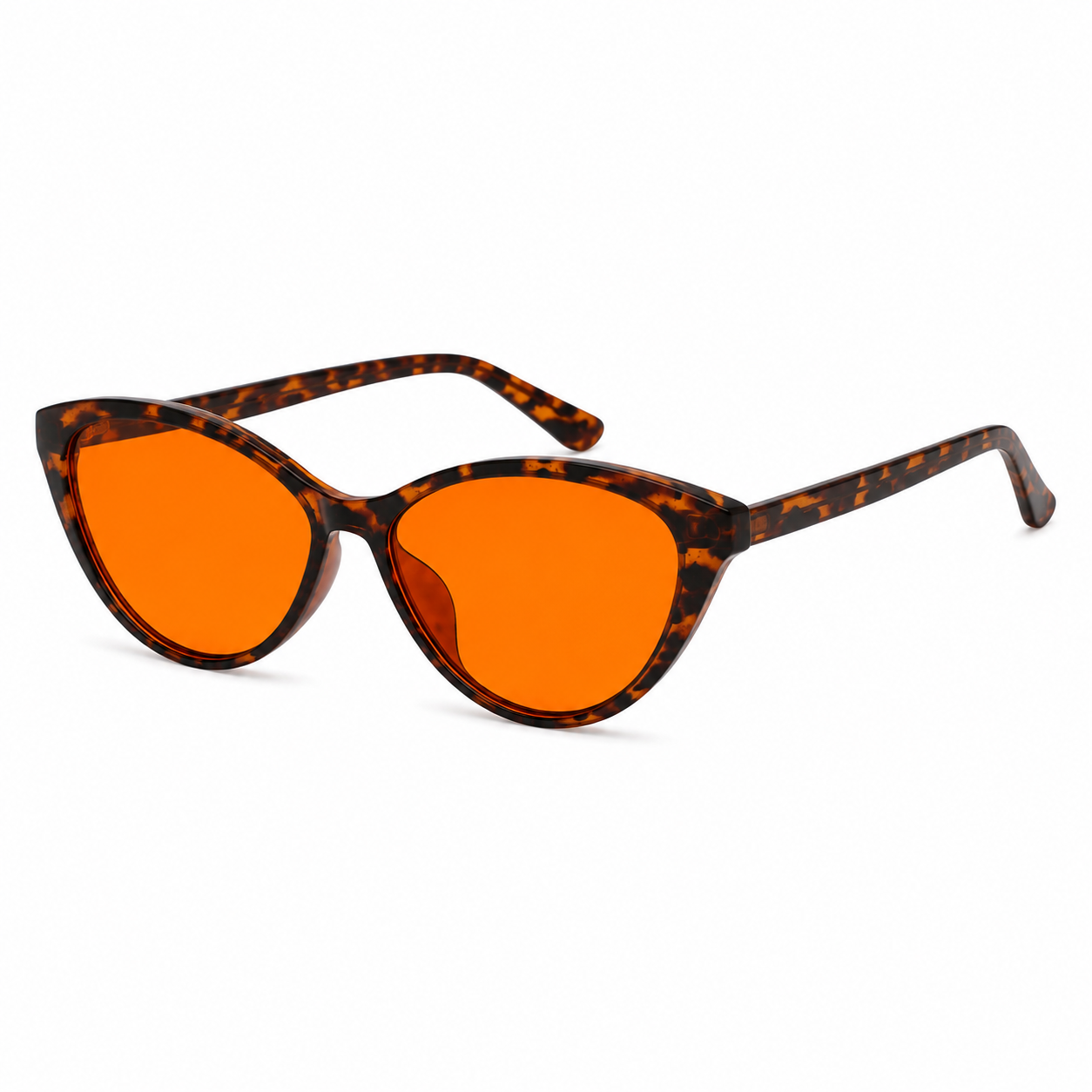 Angled view of Deep Drift cat eye blue light blocking sleep glasses with orange lenses and tortoiseshell frame for evening screen use and night-time routines
