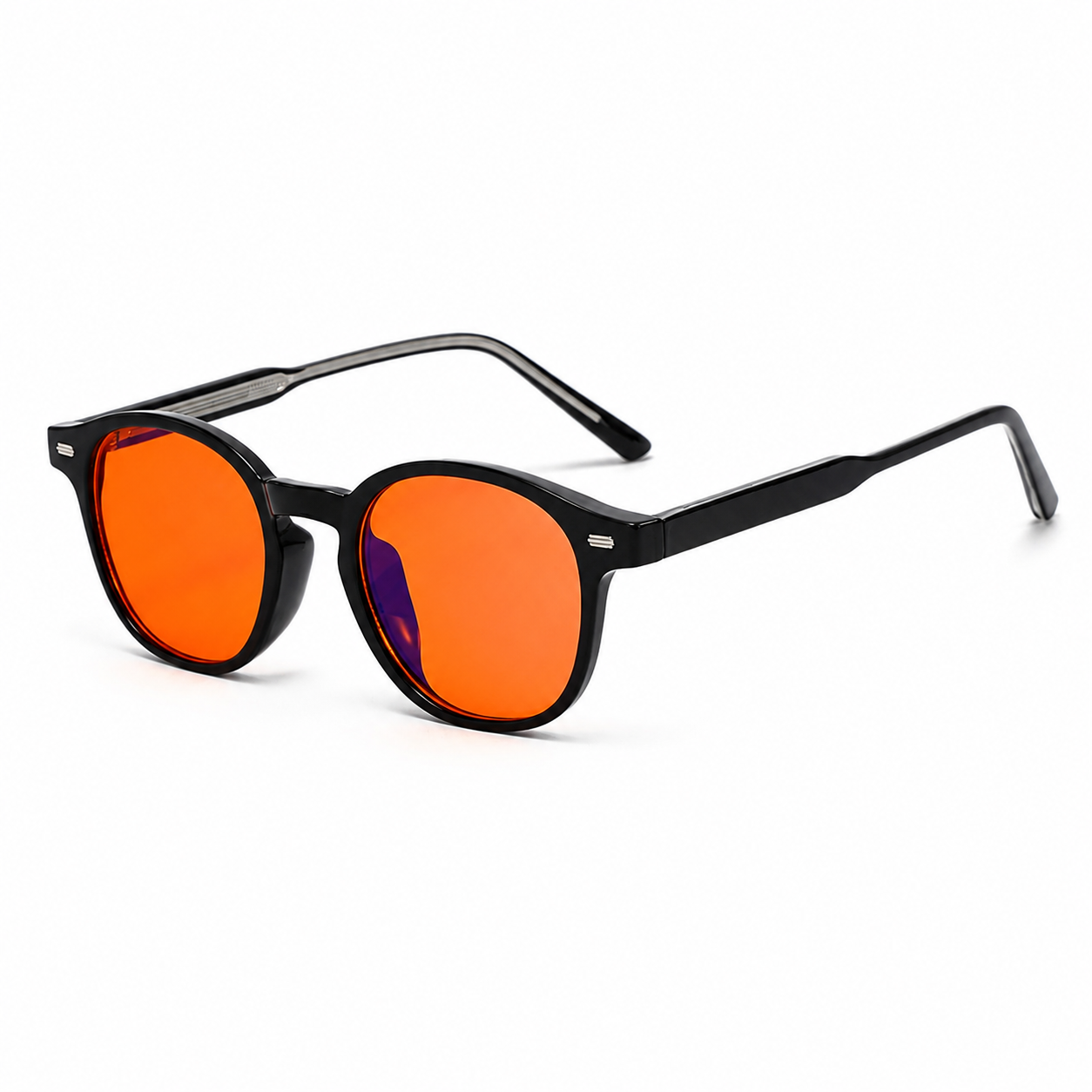 Deep Drift ember blue light blocking sleep glasses with black round frames and orange lenses angled on a white background