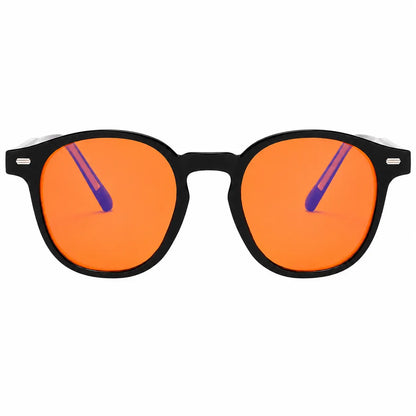 deep Drift Golden Hour blue light blocking sleep glasses with amber lenses and black round frame displayed on a white background for evening screen use and sleep support.