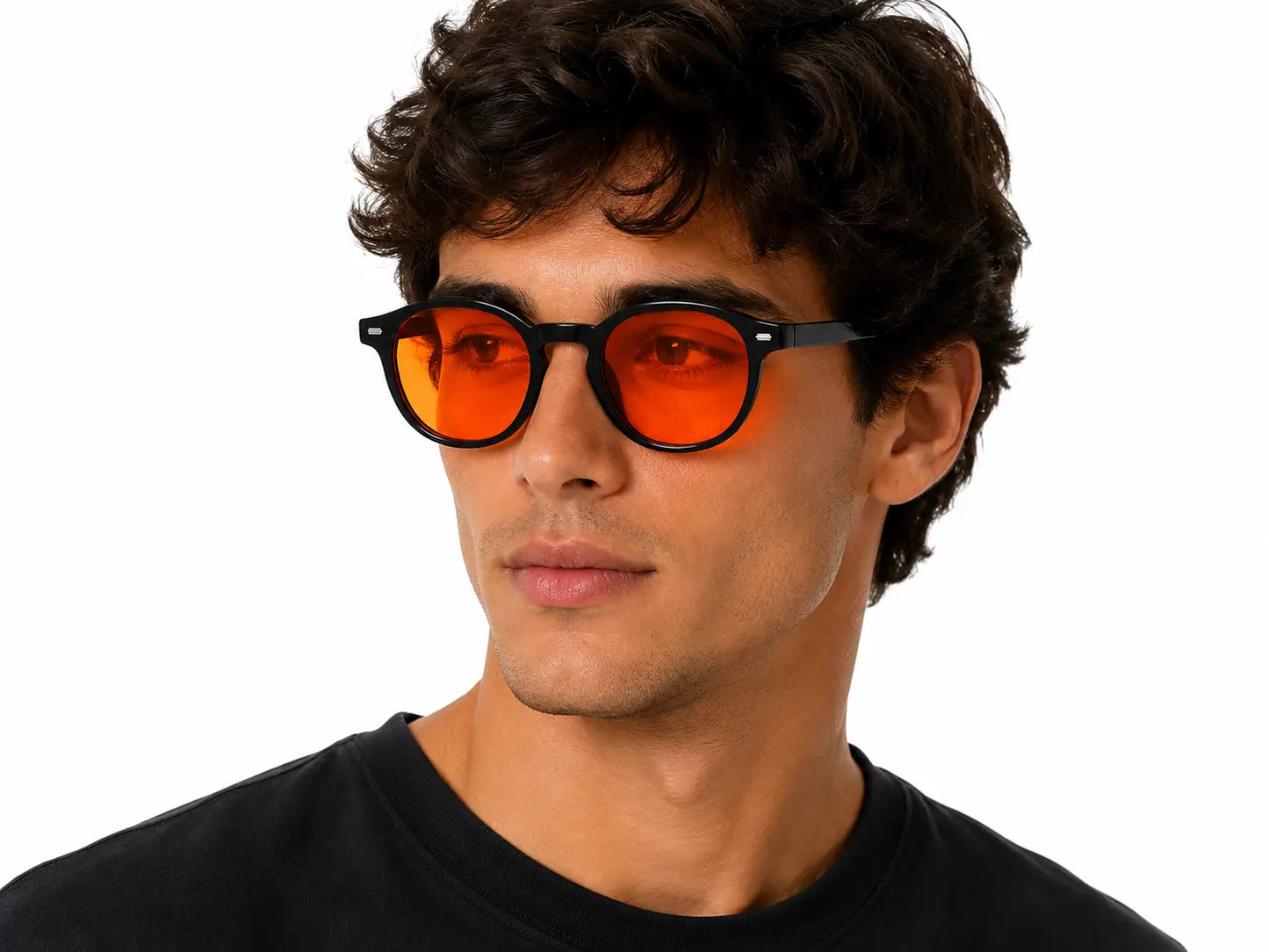 Man wearing Deep Drift Golden Hour blue light blocking sleep glasses with amber lenses, shown on a white background lifestyle portrait for evening screen use and sleep support.