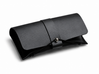 Protective black travel case included with Deep Drift NightWave Sleep Glasses for safe storage and portability.