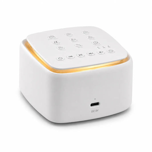 Deep Drift white noise sleep machine with USB-C charging port and warm ambient light on a white background