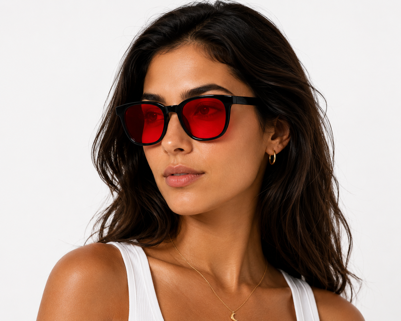 Model wearing Deep Drift blue light blocking sleep glasses with red lenses designed for evening screen use and night-time routines